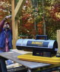 Rock Solid 50K Btu Forced Air Kerosene Heater For Job Sites And Workshops Portable Industrial Diesel Warmer on work table.