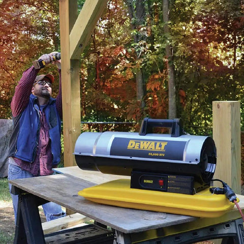 Rock Solid 50K Btu Forced Air Kerosene Heater For Job Sites And Workshops Portable Industrial Diesel Warmer on work table.