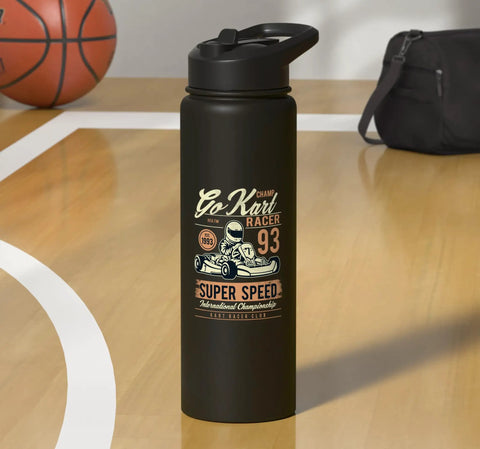 Black water bottle with 'Go Kart Racer 93' design on court, alongside basketball and gym bag.