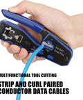 Hand using All In One Crimping Tool Kit For Ethernet And Phone Cables With RJ45 Cutter Wire Stripper And Network Crimper