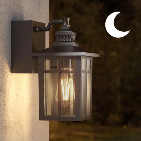 Porch Light Outdoor Dusk To Dawn With Built In GFCI Outlet 2 In 1 Wall Light illuminating at night