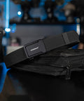 Go-To Quick-Adjust Tactical Ratchet Belt For EDC CCW And Duty Use Heavy-Duty 1000D Nylon Belt on black bag, black medium size