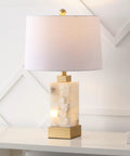 Coastal 23 Inch Gold And White Alabaster Rectangular Table Lamp With Night Light And White Linen Drum Shade on white surface