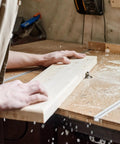 User operating a router on wood with Superior 3/4 Radius Roundover Router Bit With 1/4 Inch Shank And Durable Carbide Tip For Hella Smooth Wood Edges Includes Precision Bearing Guide For Killer Carpentry Projects.