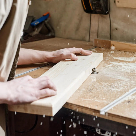 User operating a router on wood with Superior 3/4 Radius Roundover Router Bit With 1/4 Inch Shank And Durable Carbide Tip For Hella Smooth Wood Edges Includes Precision Bearing Guide For Killer Carpentry Projects.