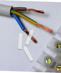 Clear Plastic Screw Covers End Caps Set For Thread Protection And Cable Shielding near exposed copper wires and connectors.