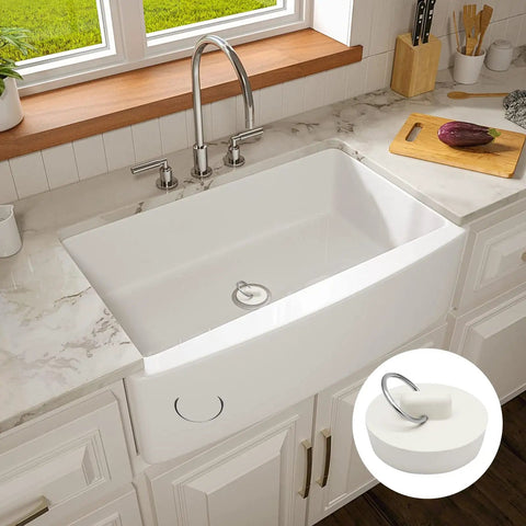 Heavy Duty Rubber Drain Plug With Hanging Ring Shuts Nasty Smells Dead Fits Like A Glove On One Point Five To One Point Six Inch Pipes Kills Clogs Fast Works Like A Charm For Kitchen And Bath Setups Two Pack White in a modern kitchen sink.