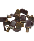 25 Pack Hella Sturdy L Shaped Cabinet Shelf Pins And Glass Support Brackets For Closet Storage Featuring Super Slick Vinyl Tipped Ends In A Sweet Antique Copper Finish For Flawless Diy Builds, showing multiple brown and bronze pins.