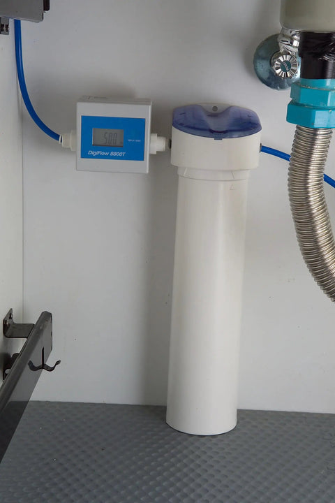 DigiFlow 8000T Flow Meter with One Quarter Inch Quick Fitting installed for precise water monitoring in home RO system.