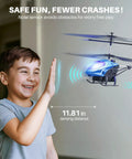Boy interacting with Remote Control Helicopter With 40 Minute Flight Time And Auto Obstacle Avoidance Altitude Hold Dual Batteries