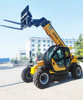 Heavy Duty Hydraulic Boom Loader Telescopic Forklift Built Different With Top Shelf Specs And Dead On Precision For Tough Daily Lifting Duties And Pro Crews in bright yellow, equipped with pallet forks, outdoors.