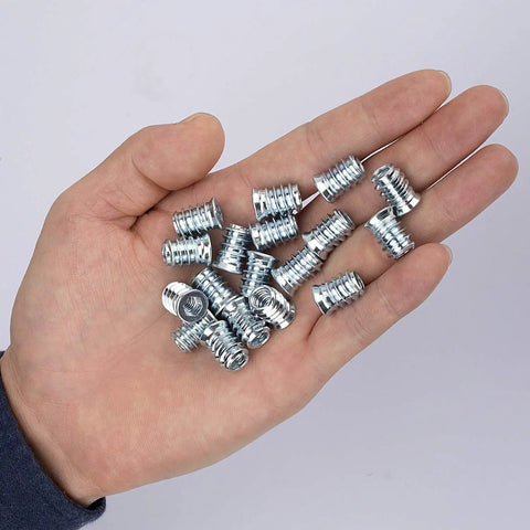 Forty Pack 1/4 20 Threaded Wood Inserts For Furniture Screw In Nuts 15mm Long Includes 1/4 Inch Allen Wrench Carbon Steel High Hardness For Long Lasting Hold shown on hand