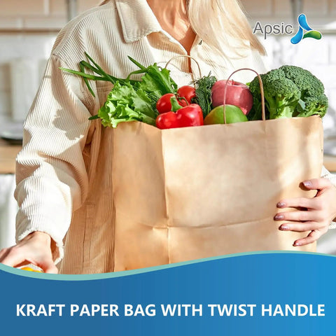 Person holding a filled 250 Pack Brown Kraft Paper Bags With Two Sturdy Handles 14x10x15.5 Inch Large Gift Bags For Takeout Retail Packaging