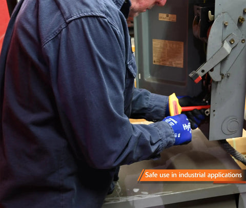 Person using Six Piece Insulated Metric T-Handle Hex Key Set For Electrical Work, 10,000V AC Tested on industrial equipment.
