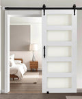 Premium Sliding Barn Door Kit 36 By 84 Inches with Header Board 6 Foot 6 Inch Track Kit and Handle shown installed in a bedroom