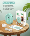 Compact Bluetooth Label Maker With Built In Rechargeable Battery And Ink Free Direct Thermal Printing For Effortless Home Organization And Straight Up Reliable Daily Labeling Jobs In Cool Green, accessories on table.