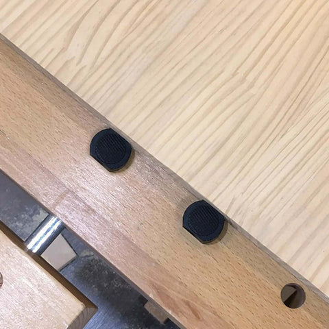 Beefy Pro Grade Bench Dogs for 19mm or 20mm dog holes shown in wood surface close-up