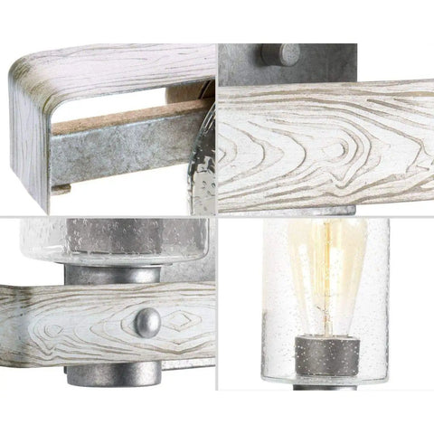 Details of Gulliver Collection Three Light Clear Seeded Glass Coastal Bath Vanity Light in Galvanized Finish, close-up view.