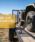 Badass Slick Retractable Ratchet Tie Down Straps For Pickup And Atv Heavy Duty 2 Inch By 15 Foot Auto Self Retracting cargo strap secured on ATV wheel.