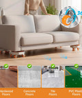 Heavy Duty Furniture Dollies With 360 Degree Rotating Rubber Wheels under a sofa, suitable for hardwood, concrete, tile, and PVC floors.