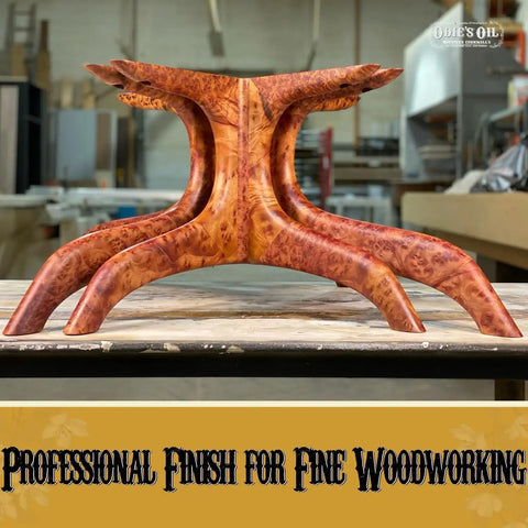 Premium Non Toxic Oil Based Wood Stain Pigment Kit With Hella Fade Resistant Black Color For Smooth Handy Projects And Top Shelf Furniture Refinishing That Delivers A Knockout Finish On Any Surface. Detailed view of a finely crafted wooden table base in a workshop.