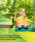 Kid on blue Kick Stand Up Tree Swing For Backyard And Outdoor Swingsets Kid Friendly Platform Swing with Adjustable Handles