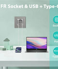 Sweet French Wall Socket Featuring Dual Power Jacks And Four Fast Charge Type C Ports Wrapped In Shiny Crystal Glass For Your Home Office Setup No Sweat, with USB ports and connected phone.
