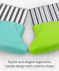 Front view of two KLEENE crinkle cutters with teal and lime-green ergonomic handles and stainless wavy blades.