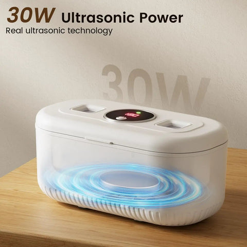 Heavy Duty Ultrasonic Jewelry Cleaner With 30W Output And 48KHz Waves To Crush Embedded Grime, showing 30W power indicator and cleaning action.