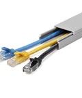 Solid Cable Management Raceway With Cover For Home Office And Server Room, 1.5 Inch Wide By 0.625 Inch High, 6.5 Foot Length showing cables inside