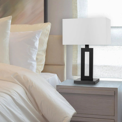 D'Alessio Table Lamp In Matte Black With Modern Cutout Body And White Linen Shade, 20 Inch Tall Diffused Light on Nightstand
