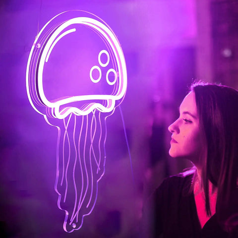 Neon Sign For Wall Decor Jellyfish Style Purple LED Light USB Powered With Dimmer glowing beside a woman observing its glow