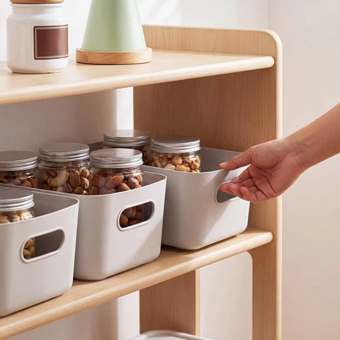 Ten Pack Gray White Plastic Storage Bins With Reinforced Handles For Home Organization And Closet Pantry Use Stackable Small Containers coordinating with jars on wooden shelf.