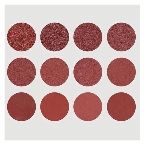 Premium 25-Piece Sanding Discs With Hook Loop Back For Easy Grip And Fast Change Includes Coarse To Fine Grits From 40 Up To 3000 For Grinding Metal Rust Polishing Wood And Complex Surfaces Like A Pro set of twelve red circular makeup pigments arranged in grid pattern.