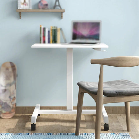 Adjustable Mobile Laptop Stand With Smooth Rolling Casters Portable Standing Desk in white, 690x480x760 mm, beside chair.