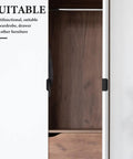 Open wardrobe with Matte Black Hidden Edge Pull Cabinet Drawer Handles 12 Pieces Aluminum Alloy 80mm Back Mount Concealed Hardware.