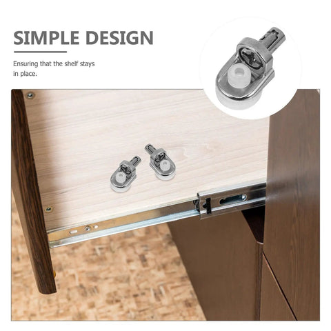 Close-up of zinc alloy shelf pins during installation in cabinet. 20 Pack Zinc Alloy Shelf Pins For Cabinets And Bookcases.