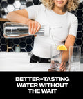 Glass Water Filter Pitcher Delivers Crisp, Clean Water In Seconds, 1.3L Capacity, in use pouring filtered water into glass