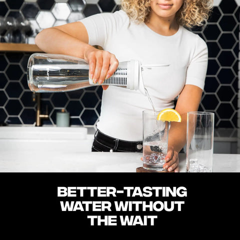 Glass Water Filter Pitcher Delivers Crisp, Clean Water In Seconds, 1.3L Capacity, in use pouring filtered water into glass