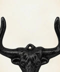 Built Tough 4 Pack Western Bull Horn Hat Hooks In Matte Black Cast Iron Wall Rack close-up of bull horn detail.