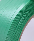 Close-up of Rock-Solid 5/8" x 0.031" x 3773' PET Strapping Roll, showcasing the green polyester strapping surface.