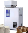 Heavy Duty Automatic Powder Filling Machine And Rock Solid Particle Dispenser For Bulk Flour Grains Seeds Coffee Beans 500g Capacity With Bullseye Accuracy Auto Counting Scale 110v with digital display and bags of flour.