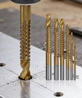 Slick Heavy Duty Three Pack HSS Twist Drill Bit Set Features Serrated Grooving Cutters And Secure Hex Shank Grip For Fast Drilling In Wood Metal Plastic Titanium Steel Works Like A Charm showing drill bits on metal surface.