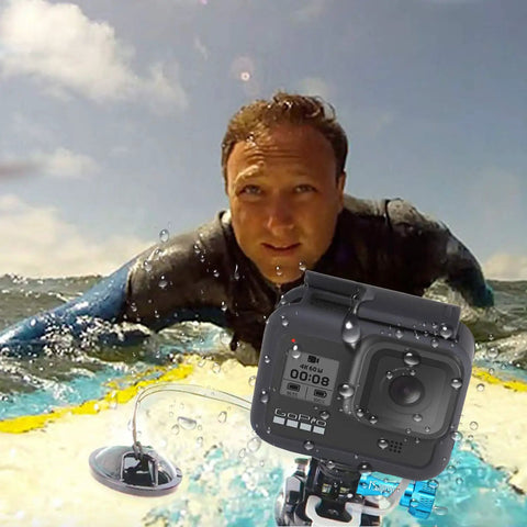 Surfer using Adhesive Mount Kit For GoPro And Action Cameras 10 Pack Flat And Curved Mount Pads, camera attached to board.