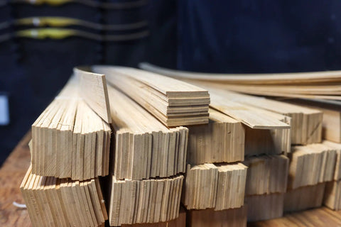 Stack of flattened bamboo strips for bow making and woodworking build bows and bendable projects with a back of bow layer.