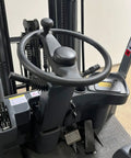 Heavy Duty Electric Pallet Stacker 197 Inch Lift Height 6600 Lb Capacity control panel and steering wheel view for industrial use.