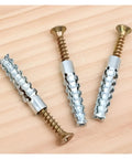 Close-up of 150 Piece Metal Expansion Tube Self Tapping Screws Set For Concrete Wall Anchors Drilling Plated Galvanized Anti Corrosion