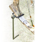 Must Have Portable Archer Ground Stake With 360 Degree Rotating Fork and camo bow setup in grass field