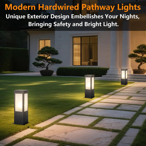Rock Solid 15.75 Inch Outdoor Bollard Path Lights With Knockout Aluminum Frame And Frosted Glass Shade casting light along a stone pathway.