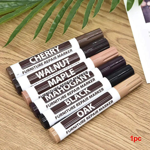 Set of furniture wood repair markers in various colors, including a black marker for easy DIY scratch fix on floors and tables.